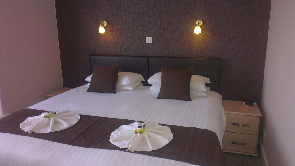 Wayside Cheer Hotel Castel Rum bild